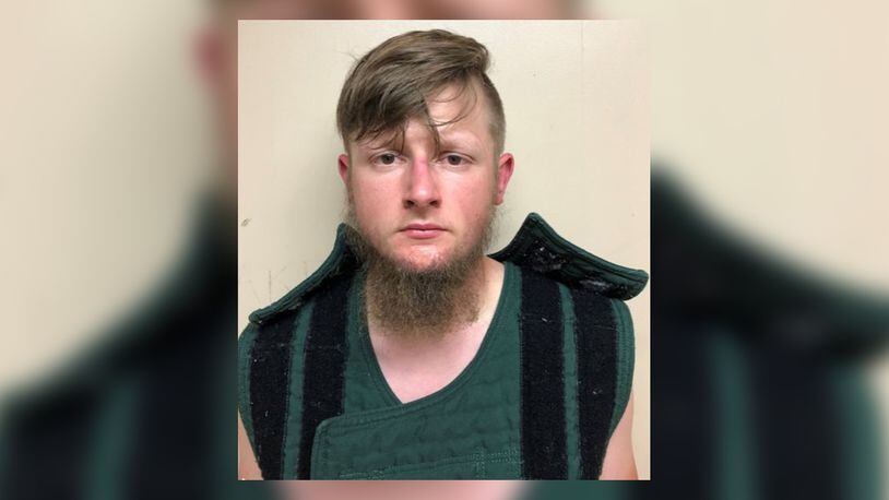 Robert Aaron Long, 21, of Woodstock, was arrested in Crisp County and charged with murder in the case of three separate shootings that left eight people dead.