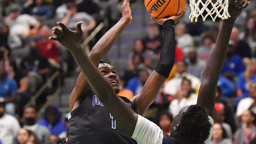 March 5, 2022 Buford - Newton's Qua Brown (1) shoots against Norcross' Jerry Deng (15) in the second half of 2022 GHSA Basketball Playoffs at Buford Arena on Saturday, March 5, 2022. Norcross won 75-72 over Newton. (Hyosub Shin / Hyosub.Shin@ajc.com)