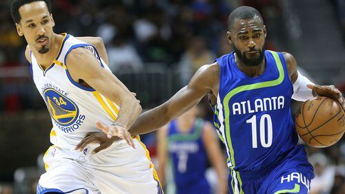 March 6, 2017, Atlanta: Atlanta Hawks Tim Hardaway Jr. drives against Golden State Warriors Shaun Livingston during the second period in a NBA basketball game on Monday, March 6, 2017, in Atlanta. Curtis Compton/ccompton@ajc.com