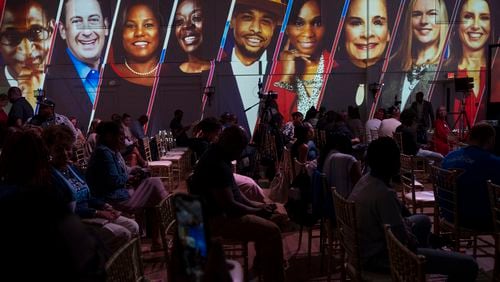 A projection of the candidates for the Atlanta school board shines on the wall of the Ali Events space before a debate Wednesday, Sept. 20, 2023.   (Ben Gray / Ben@BenGray.com)