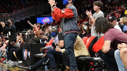 October 21, 2021 Atlanta - Atlanta Braves fan cheers during the first half of the home opener in a NBA basketball game at State Farm Arena on Thursday, October 21, 2021. (Hyosub Shin / Hyosub.Shin@ajc.com)