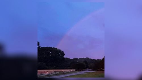 A rainbow appeared Monday morning over the barn at Blue Springs Farm where 24 horses were killed in a fire. It was considered one of the worst agrarian losses in Forsyth County in decades.