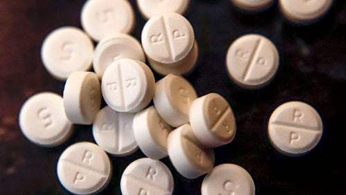 FILE - Cobb County approved the settlement of another opioid lawsuit with manufacturers and retail pharmacy chains. (AP Photo/Keith Srakocic, File)
