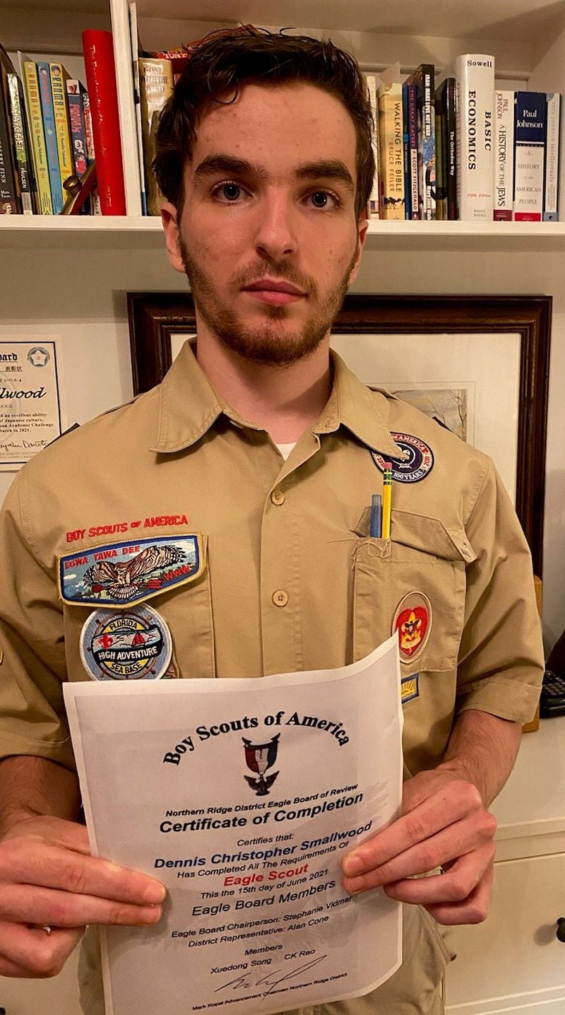 The Northern Ridge Boy Scout District (Cities of Roswell, Alpharetta, John’s Creek, Milton) is proud to announce its newest Eagle Scout,  who passed his Board of Review On June 15: Dennis Smallwood, of Troop 841, sponsored by St Thomas Aquinas Catholic Church, whose project was the design and construction of a picnic area around the old Log Cabin owned by the City of Alpharetta.  Dennis leveled the ground with hand tools, constructed 2 picnic tables and then beautified the area by planting shrubbery