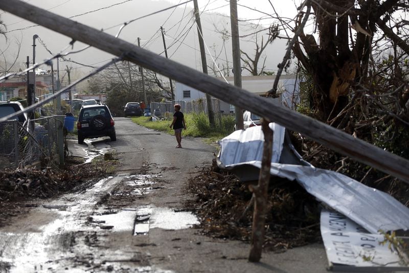 SAN JUAN, Puerto Rico —Downed paper lines and debris are seen in the aftermath of Hurricane Maria in Yabucoa, Puerto Rico on Tuesday. (AP Photo/Gerald Herbert)