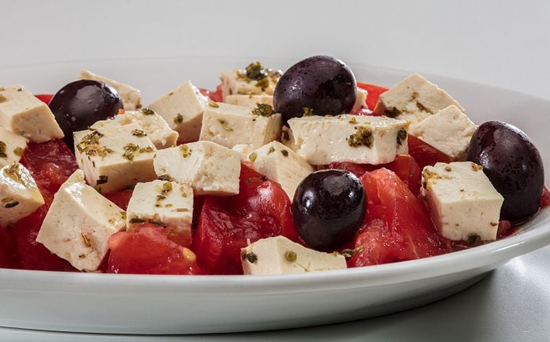 Vegan Greek tofu feta, from "Low-FODMAP and Vegan" by Jo Stepaniak, can be used in a salad with tomatoes and olives. Food styling by Lisa Schumacher.(Zbigniew Bzdak/Chicago Tribune/TNS)