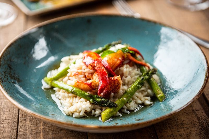 Lobster and saffron risotto is an option on the Mother's Day brunch menu at Cru Wine Bar at Avalon and the Battery. / Courtesy of Cru Wine Bar