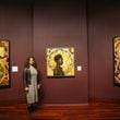 Spelman College Museum of Fine Art executive director Liz Andrews shows Harmonia Rosales' "Master Narrative" exhibition, one of 2023's visual arts highlights in Atlanta. (Olivia Bowdoin, For the AJC).