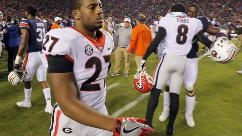Nick Chubb (27) leaves the field after his team's 40-17 loss.  UGA plays Auburn in a NCAA college football game at Auburn  BOB ANDRES  /BANDRES@AJC.COM