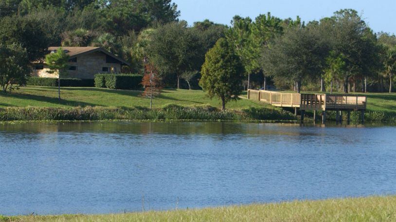 A Florida man nearly drowned trying to rescue his dog from a lake while the family was trying to take a photo at a park. (Photo courtesy Pinellas County Marketing and Communications Department)