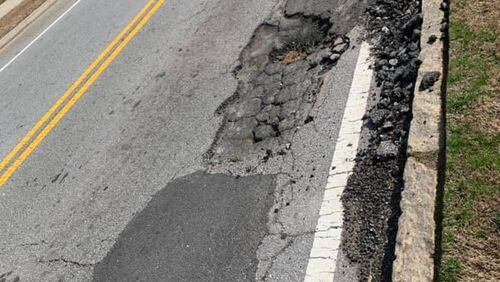 Charles Bohanan wants the potholes of Frazier Road fixed permanently. (Photo/Charles Bohanan).