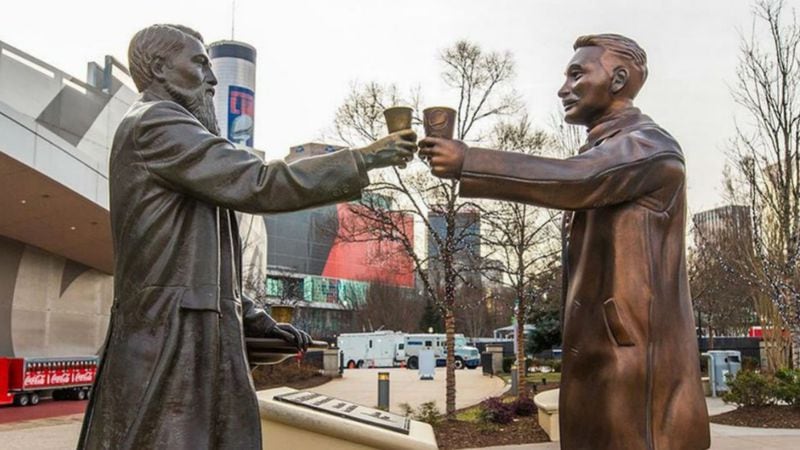 A statue of Pepsi founder Caleb Bradham, right, was delivered to the World of Coca-Cola on Wednesday and placed in front of the statue of Coca-Cola founder John Pemberton, left, as part of a promotional “cola truce” during Super Bowl week. Pepsi is an official sponsor of the Super Bowl and has placed highly visible advertising across downtown Atlanta. (Photo: Pepsi)