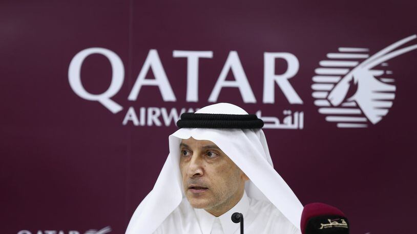 Qatar Airways chief executive Akbar Al Baker, shown here speaking at the Arabian Travel Market this month in Dubai, says U.S. carriers offer 'crap service.'