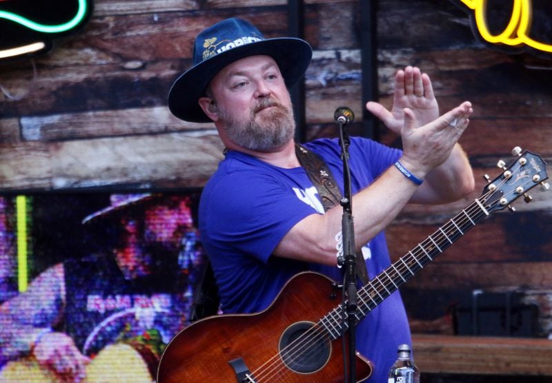 Zac Brown Band's John Driskell Hopkins during the near sold-out Truist Park concert Friday, June 17, 2022 on their Out in the Middle tour.
Robb Cohen for the Atlanta Journal-Constitution