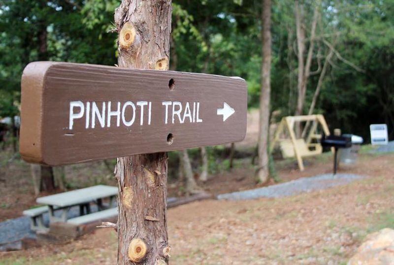 A sign points visitors to the Pinhoti Trail from the parking lot of the Potts Hollow Trailhead in northwest Polk County. (Photo Courtesy of Jeremy Stewart)
