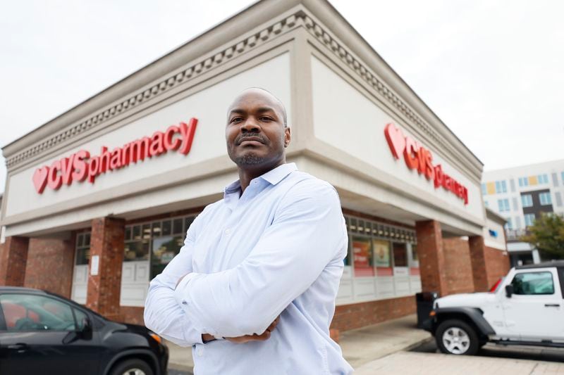 Jabari James, a pharmacist and CVS district manager responsible for supervising 20 CVS pharmacies in the metropolitan Atlanta area, outside the North Decatur Store on Wednesday, Sept. 13, 2023. 
James said he would closely monitor pharmacy stock levels and advise individuals to receive vaccines promptly when they become accessible.
Miguel Martinez /miguel.martinezjimenez@ajc.com