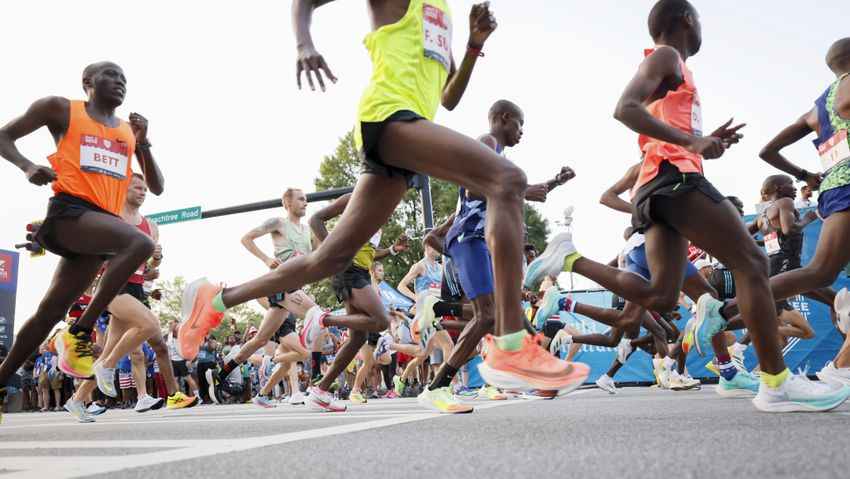 Elite men's runners take off at the 53rd running of the Atlanta Journal-Constitution Peachtree Road Race in Atlanta on Sunday, July 3, 2022. (Miguel Martinez / Miguel.Martinezjimenez@ajc.com)