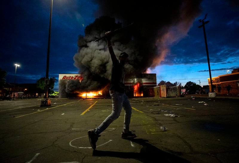 Violent protests broke out in Minneapolis for a second straight night Wednesday, with protesters in a standoff with officers outside a police precinct and looting of nearby stores. 