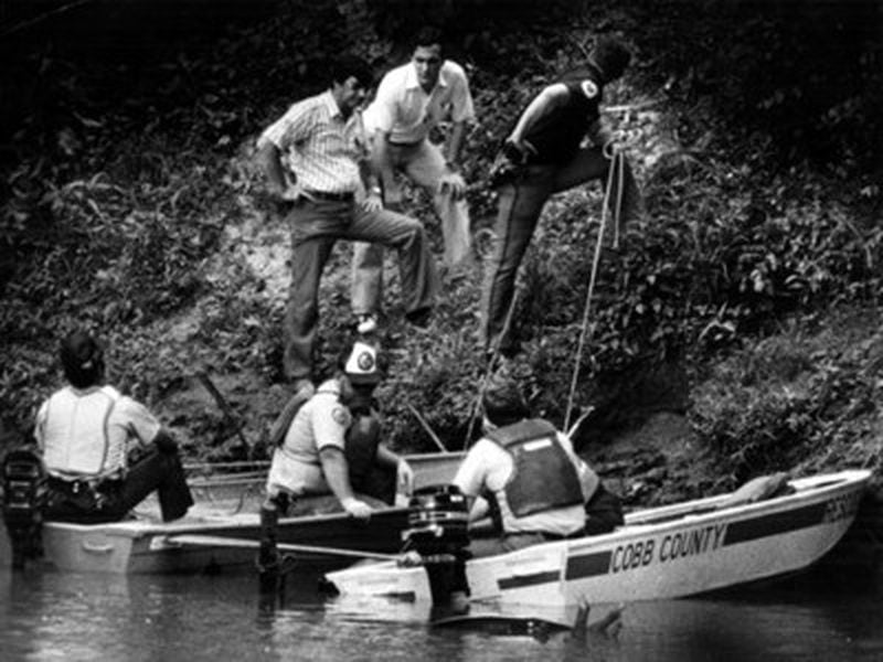 The body of Nathaniel Cater, 27, is pulled from the Chattahoochee River in this 1981 photo. Wayne Williams was convicted of the murder of Cater and Jimmy Ray Payne, 21, in 1982. Williams never stood trial for murdering a child.