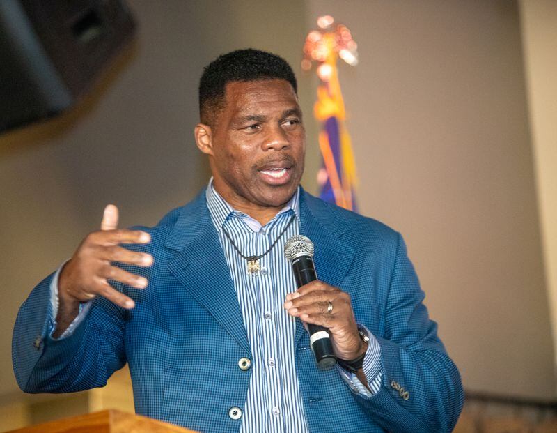 Herschel Walker campaigns at Mojitos Bistro in Norcross on September 26, 2022  in his bid for a U.S. Senate seat. (Jenni Girtman for The Atlanta Journal-Constitution)
