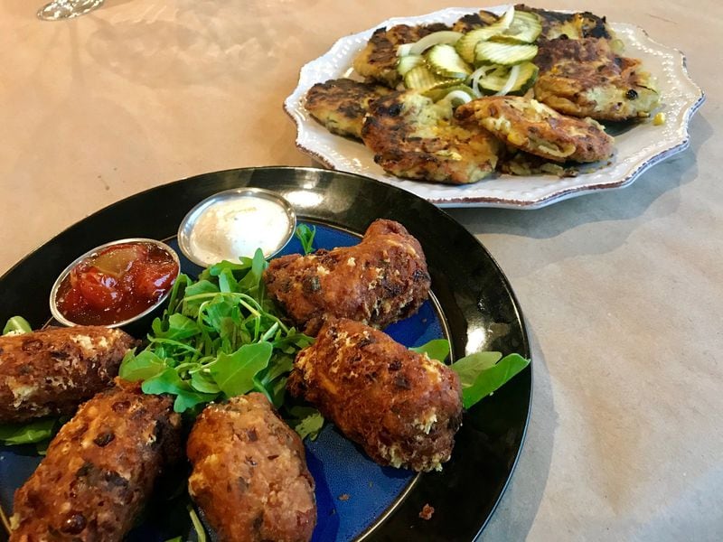 Bruce Bogartz offers a traditional take on latkes (rear), as well as a version that sees them shaped as tater tots. Accompaniments include tomato jam, horseradish sauce and bread and butter pickles. CONTRIBUTED BY LIGAYA FIGUERAS