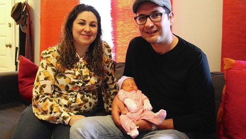 Anna Gaxiola-Leal and Jos Alberto Leal with their newborn baby Annabella. The couple waited seven years for the baby after two pregnancy loses. Johanes Rosell /MundoHispanico
