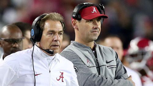 Nick Saban (left) and Steve Sarkisian coached together at Alabama for just one game.