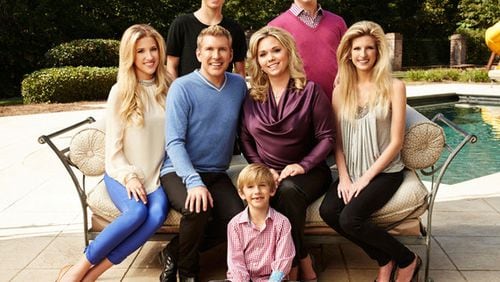 Todd Chrisley's family from season one, including Kyle (top right). CREDIT: USA