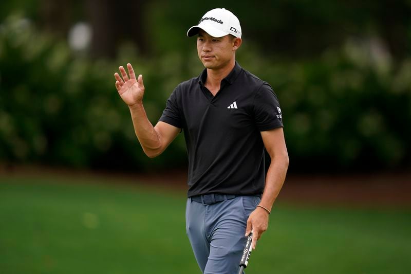 Collin Morikawa waves after making a putt on the first hole during the first round of the Wells Fargo Championship golf tournament at the Quail Hollow Club Thursday, May 9, 2024, in Charlotte, N.C. (AP Photo/Erik Verduzco)
