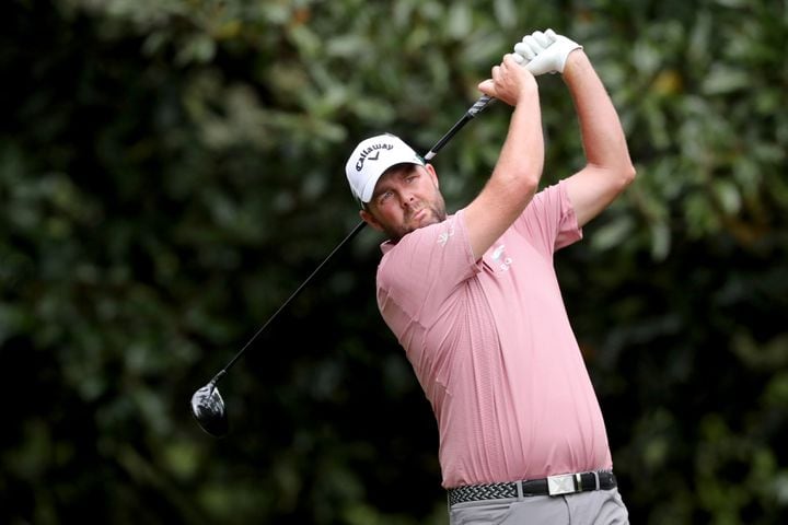 April 8, 2021, Augusta: Marc Leishman tees off on the eleventh hole during the first round of the Masters at Augusta National Golf Club on Thursday, April 8, 2021, in Augusta. Curtis Compton/ccompton@ajc.com