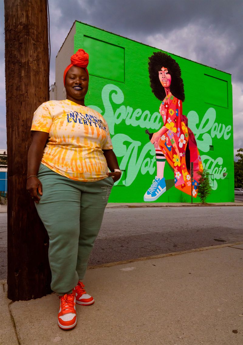 Atlanta artist Yuzly Mathurin finished his mural at the back of the Plaza Theater in Poncey-Highland in the spring.  She said it was by far the biggest painting she had ever done and it allowed her to do more.  (Courtesy of Brock Scott / Living Walls)