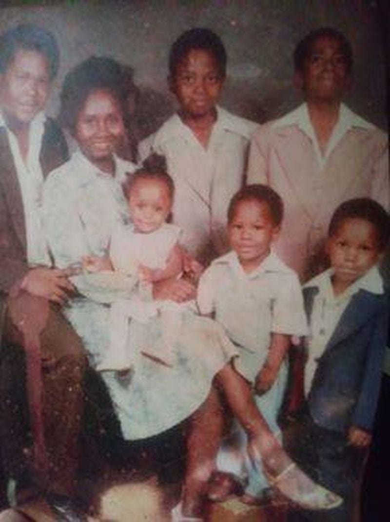 In this family photo from the early 1980s, Shanta is sitting on her mother’s lap beside her father and four brothers. “I didn’t feel anything, I was a baby,” Alexander said. “My mama went through all of the drama and headache.” (Family photo)