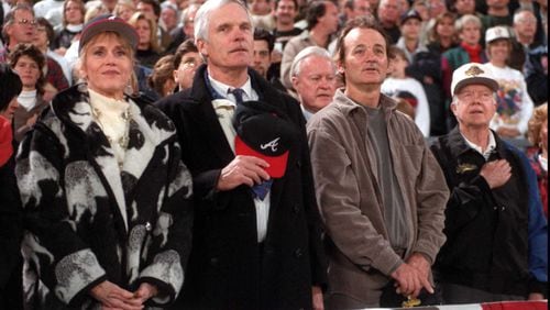 WORLD SERIES GAME 6 10/28/95: Standing for the national anthem are (L-R), Jane Fonda, Ted Turner, actor Bill Murray ,and former president Jimmy Carter. (AJC photo/Jonathan Newton)