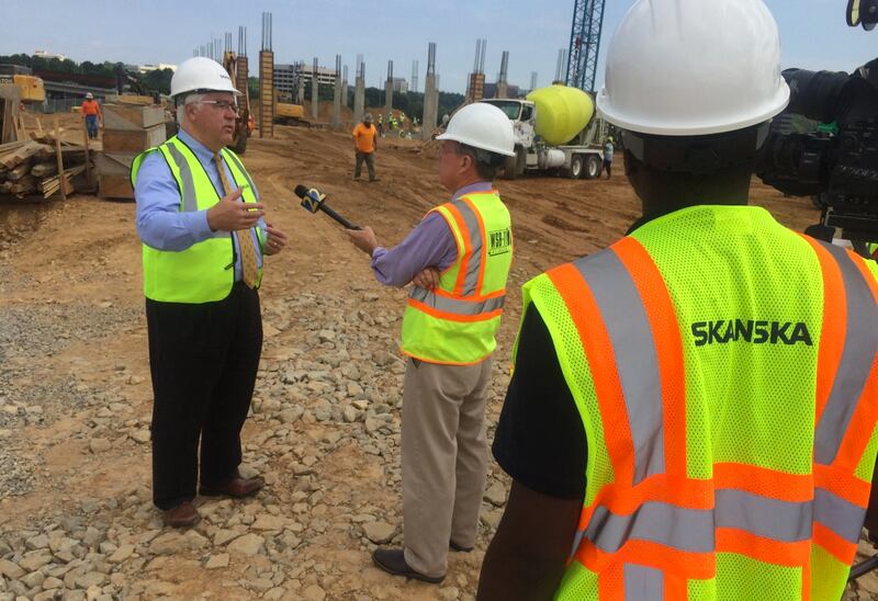 Tim Lee gives an interview at the site of the new Braves stadium. Photo: Jim Galloway, jgalloway@ajc.com