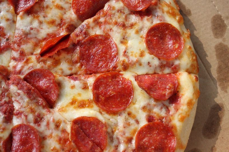 Lawsuits filed against Little Caesars alleged it served pork that was sold as "halal pepperoni." A judge tossed out one lawsuit against the pizza chain Thursday, Sept. 21, 2017, but allowed another to move forward. Here, pepperoni pizza from Little Caesars.