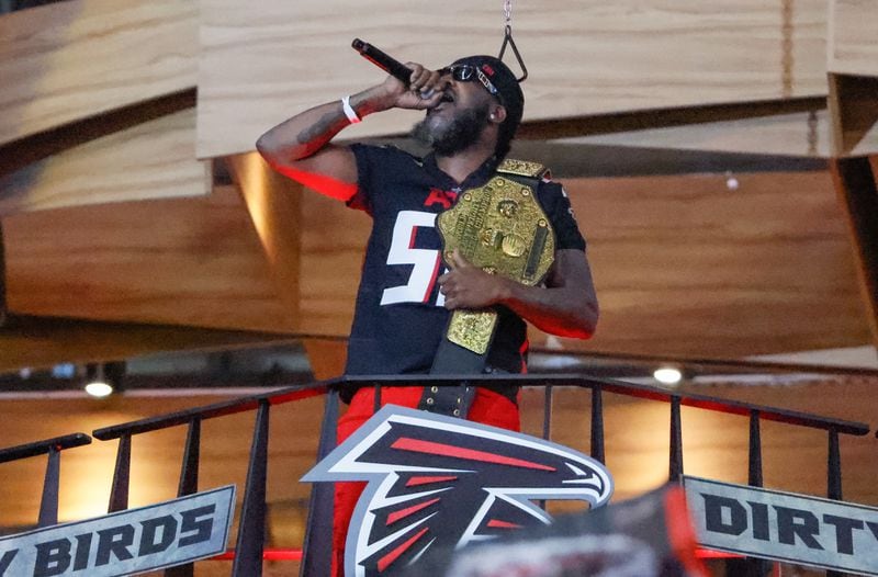 Pastor Troy performs during a break in the game. The Atlanta Falcons celebrate Hip-Hop 50 with performances and appearances during their NFL football game between the Atlanta Falcons and the New Orleans Saints in Atlanta on Sunday, Nov. 26, 2023.   (Bob Andres for the Atlanta Journal Constitution)