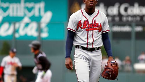 Braves pitcher Tyrell Jenkins reacts after giving up a three-run home run to Colorado Rockies' Nolan Arenado in the first inning Sunday. The Braves lost for the eighth time in 10 games since the All-Star break. (AP photo)