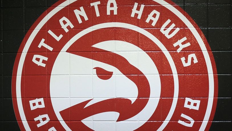 A new Hawks logo is painted on the tunnel wall leading out to the court for the first regular season basketball game "home opener" on Tuesday, Oct. 27, 2015, in Atlanta.  Curtis Compton / ccompton@ajc.com