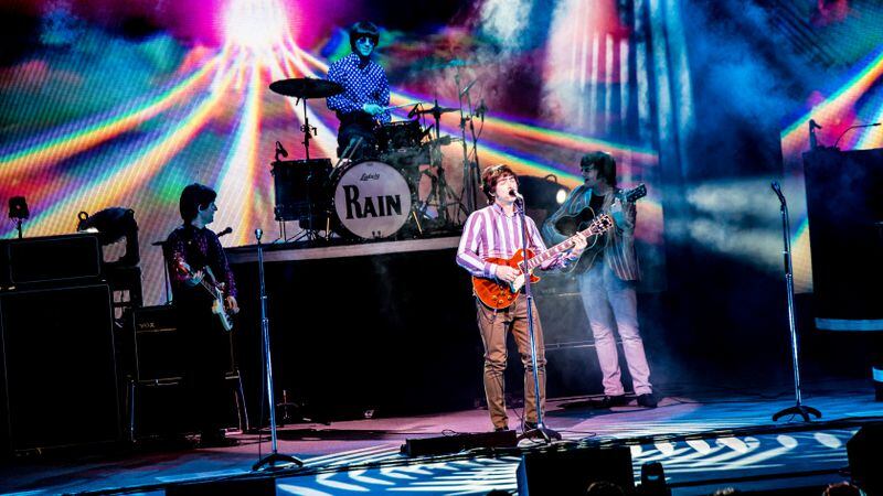  Rain: A Tribute to the Beatles, includes set changes and multimedia elements. Photo: Matt Christine