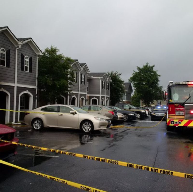 Gwinnett fire and Norcross police respond to an overnight fatal fire at a Summer Place townhome Tuesday. The GBI was requested to assist in the death investigation. (Credit: Gwinnett County Fire Department)
