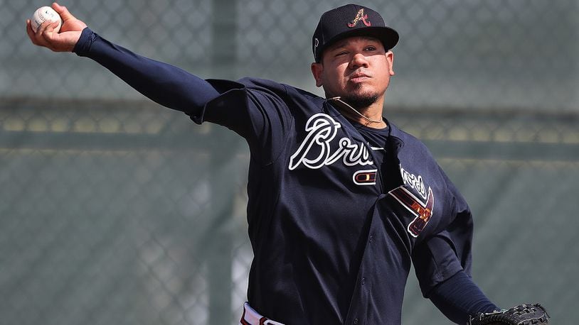 Braves pitcher Felix Hernandez delivers a pitch working from the mound during the first workout at spring training on Thursday, Feb. 13, 2020, in North Port, Fla.  Curtis Compton ccompton@ajc.com