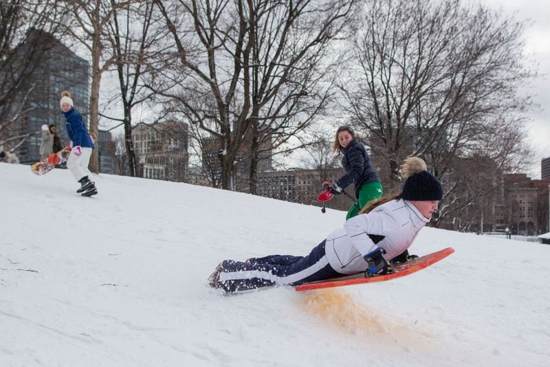 BOSTON, MA - FEBRUARY 13:  A girl sleds on Boston Common following a winter storm February 13, 2017 in Gloucester, Massachusetts. (Photo by Scott Eisen/Getty Images)
