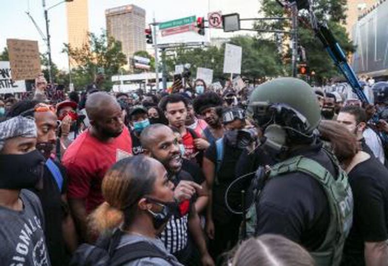 Tensions escalated at times Monday during protests in Atlanta.