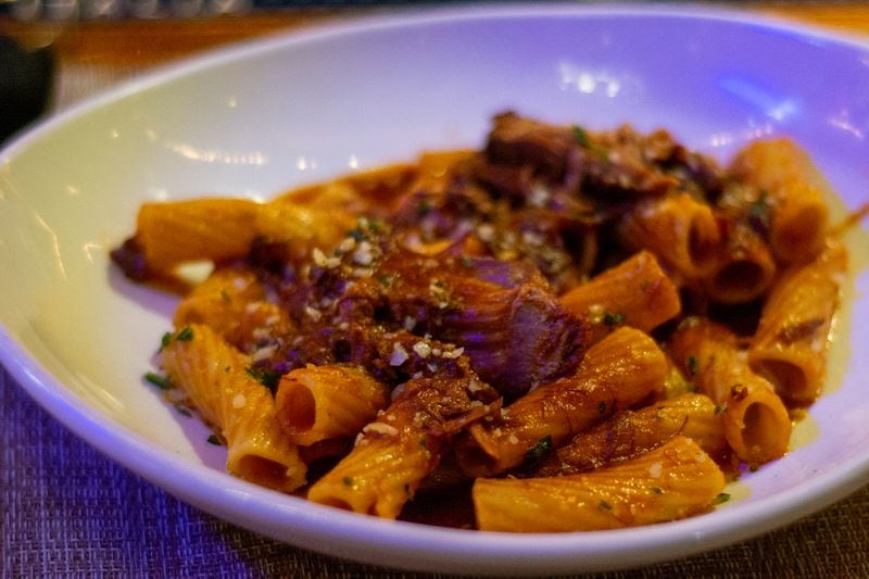 Rigatoni with lamb osso buco is one of Amore e Amore's specialty pastas made with homemade rigatoni pasta and slow-braised tender pieces of lamb. 
(Lizzie McIntosh Simpson for The Atlanta Journal-Constitution)