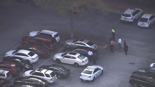 About 10 a.m., a call came in to police about a car in the north parking lot of the H.E. Holmes MARTA station, MARTA spokeswoman Alisa Jackson said. (Credit: Channel 2 Action News)