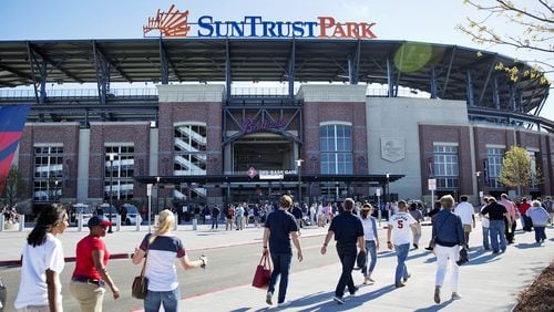 Attendance has increased about 36 percent per game at SunTrust Park, compared with the same point last year at Turner Field. (AP Photo/David Goldman, File)