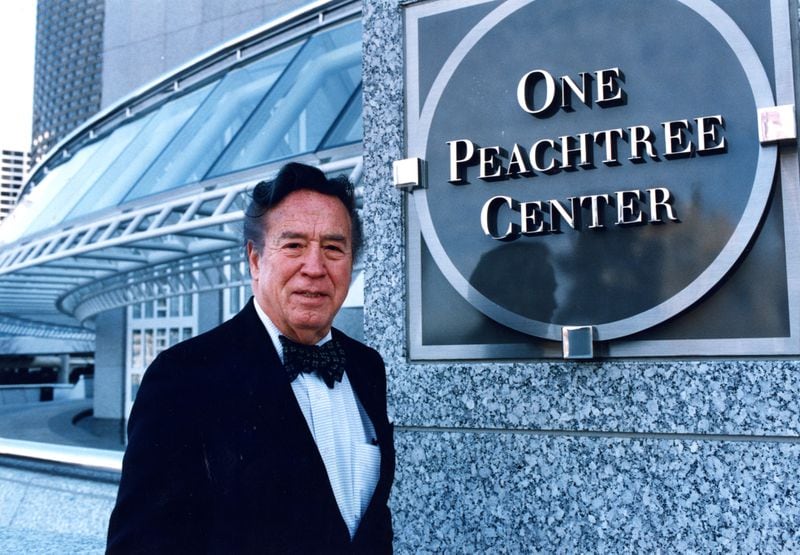 Architect and developer John Portman outside his new building One Peachtree Center in Atlanta on Dec. 8, 1992. (RICH MAHAN / AJC file photo)