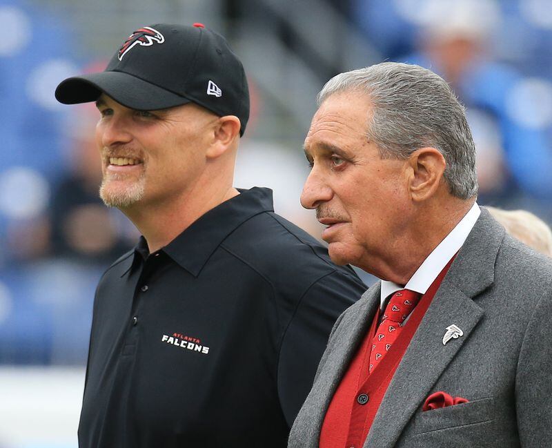 102515 NASHVILLE: -- Falcons head coach Dan Quinn and team owner Arthur Blank look on as the team prepares to play the Titans in a football game on Sunday, Oct. 25, 2015, in Nashville. Curtis Compton / ccompton@ajc.com
