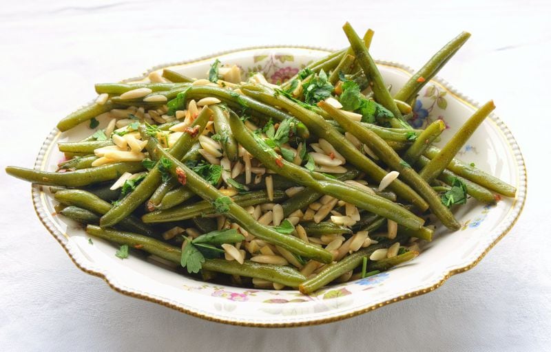 Toni Tipton-Martin’s Green Bean Amandine, blanched haricots verts tossed in butter, olive oil and garlic and perked up with paprika, is a study in simplicity. 
