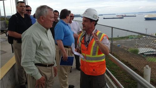 Gerry Del Rio, a project manager, briefs Gov. Nathan Deal on the expansion of the Panama Canal in Colón, Panama in 2013. Greg Bluestein, gbluestein@ajc.com